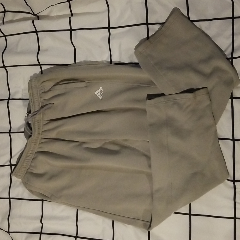 Adidas sweatpants.